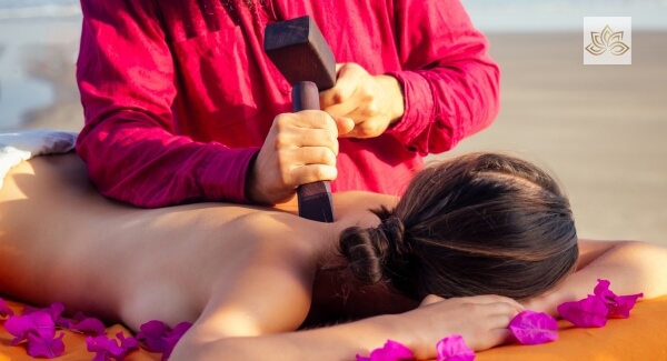 What Is Tok Sen Massage? The Traditional Thai Hammer Massage